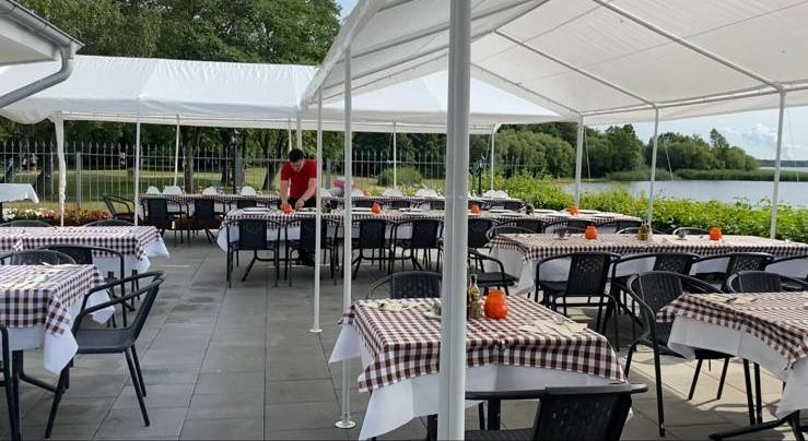 Covered terrace laid for a celebration