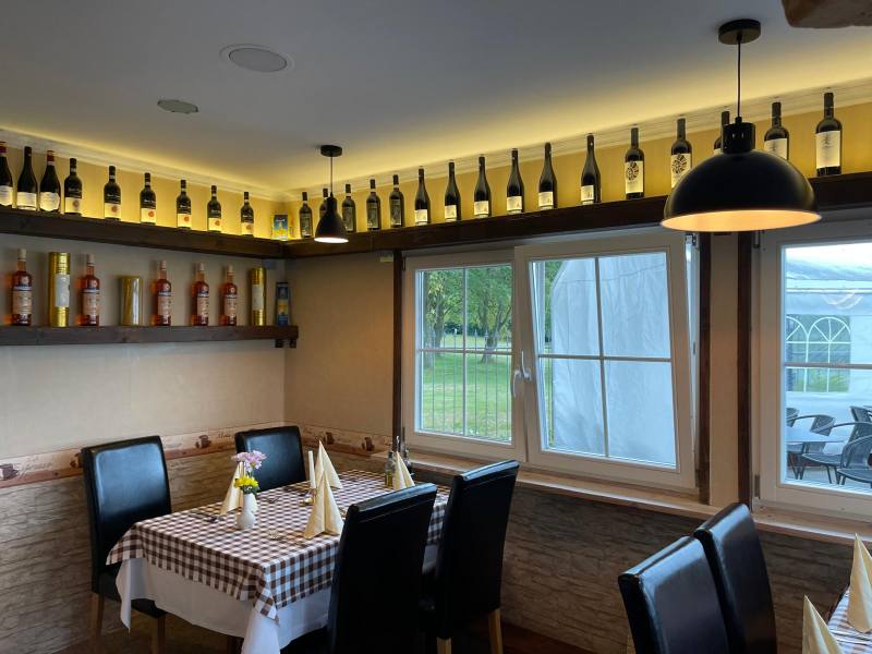 Tables by the window overlooking the greenery