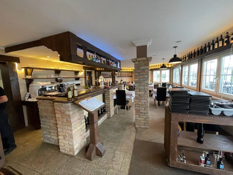 Bar and dining room with window front