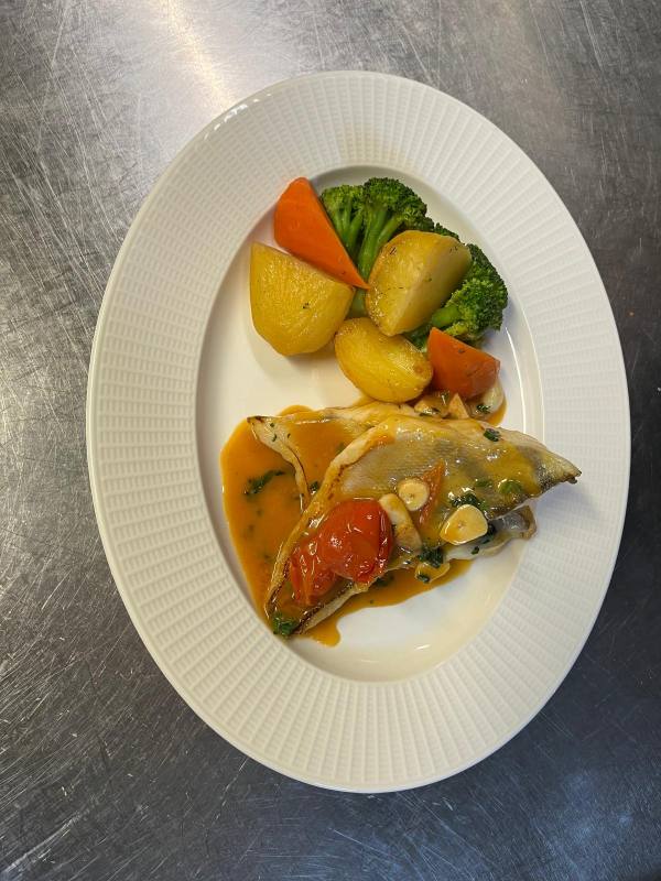 Fish fillet with vegetables and potatoes
